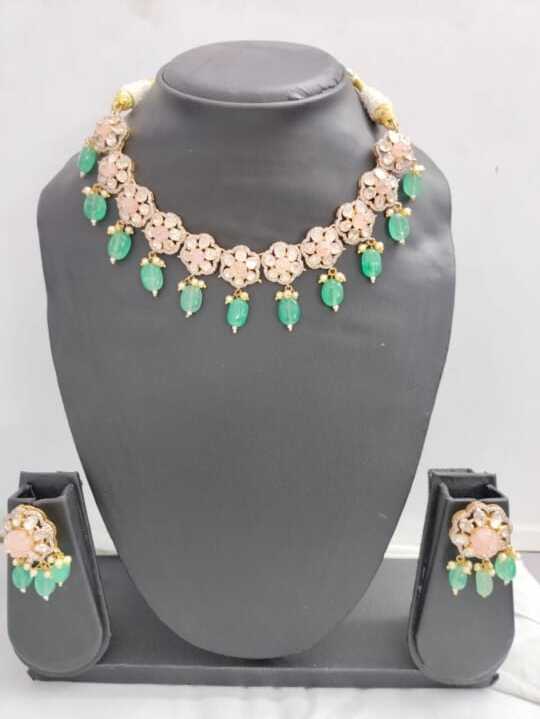 Necklace in 14 kt gold hm studded with diamonds/ pokies & gem stones